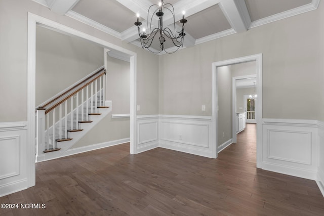 unfurnished dining area with an inviting chandelier, coffered ceiling, beamed ceiling, wood finished floors, and stairway