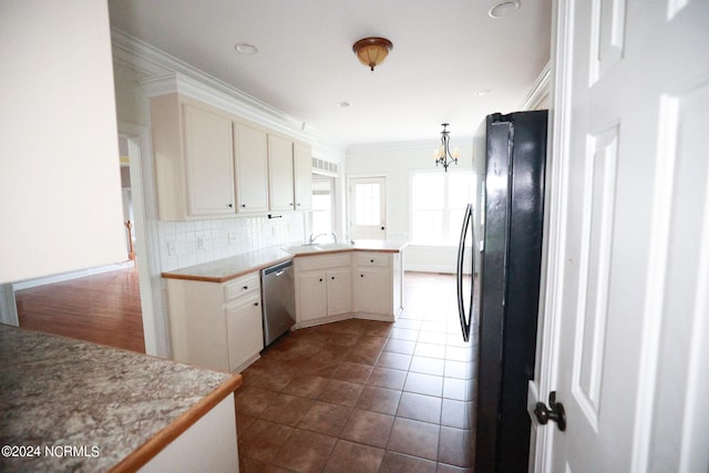 kitchen with black fridge, dishwasher, decorative light fixtures, and ornamental molding