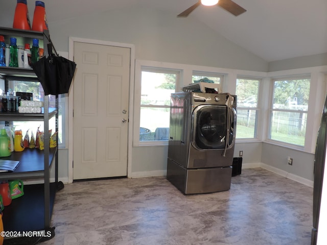 laundry room with ceiling fan and washing machine and dryer