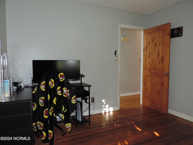 home office featuring dark wood-type flooring