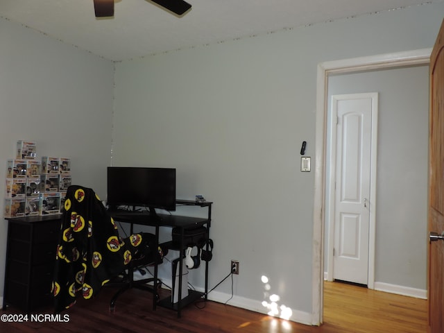 office space with hardwood / wood-style floors and ceiling fan