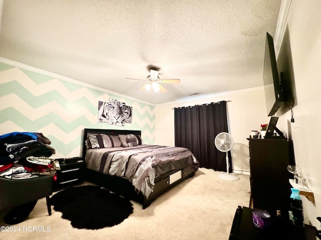 carpeted bedroom featuring a textured ceiling, crown molding, and ceiling fan