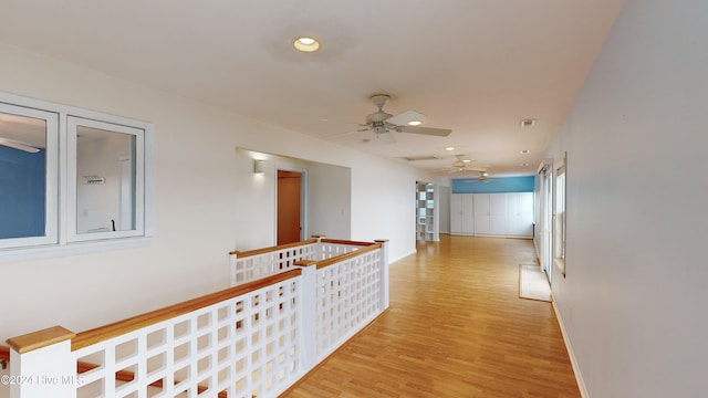 corridor featuring light hardwood / wood-style flooring