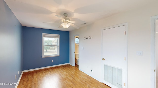 spare room with ceiling fan and light hardwood / wood-style flooring