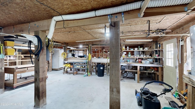 basement with a workshop area