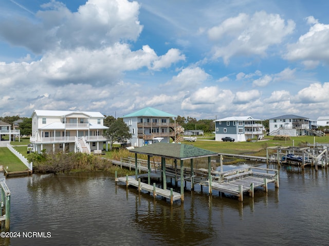 dock area featuring a water view