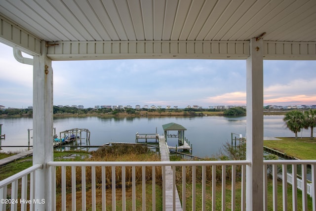 property view of water featuring a boat dock