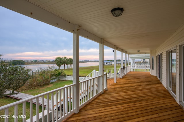 deck at dusk with a water view