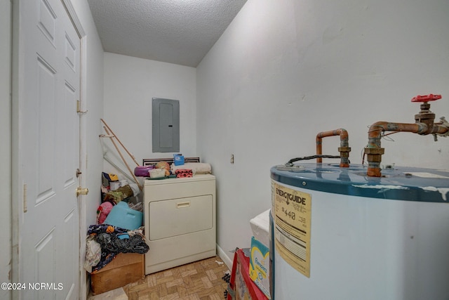 clothes washing area with water heater, washer / clothes dryer, light parquet flooring, a textured ceiling, and electric panel