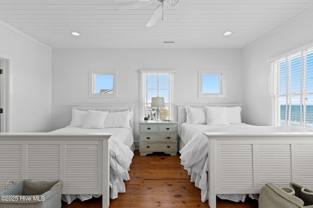 6615 W Beach Dr, Oak Island, NC 28465 - bedroom with wood finished floors, recessed lighting, and ceiling fan