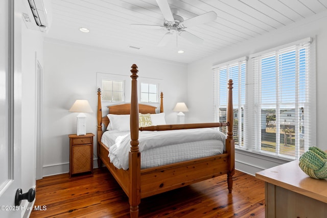 6615 W Beach Dr, Oak Island, NC 28465 - bedroom with multiple windows, hardwood / wood-style floors, wood ceiling, recessed lighting, and a ceiling fan