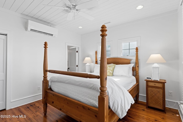 6615 W Beach Dr, Oak Island, NC 28465 - bedroom featuring a wall unit AC, wood finished floors, recessed lighting, wooden ceiling, and ceiling fan