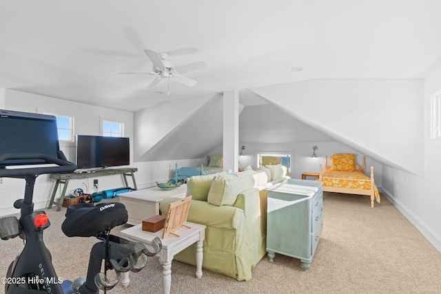 6615 W Beach Dr, Oak Island, NC 28465 - living area with ceiling fan, light carpet, baseboards, and vaulted ceiling
