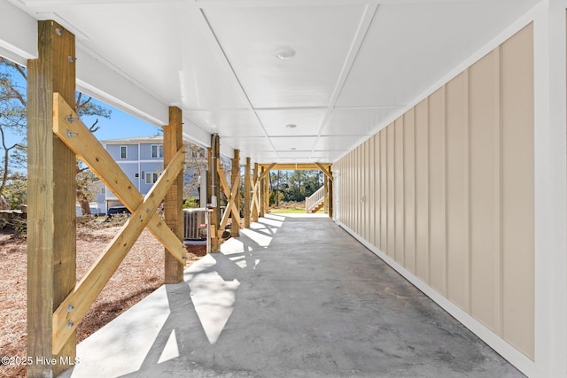 6615 W Beach Dr, Oak Island, NC 28465 - view of patio / terrace featuring stairs