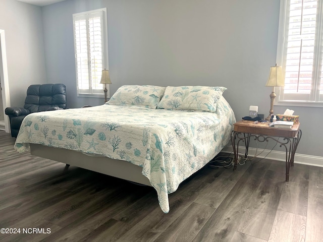 bedroom featuring dark hardwood / wood-style floors