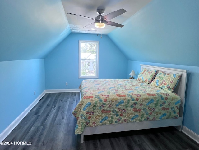 unfurnished bedroom featuring ceiling fan, lofted ceiling, and dark hardwood / wood-style floors