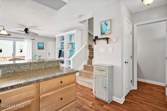 113 Scallop Ln, Carolina Beach, NC 28428 - kitchen with wood finished floors, ceiling fan, a textured ceiling, and light brown cabinetry