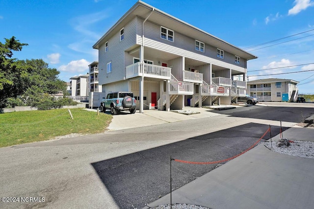 113 Scallop Ln, Carolina Beach, NC 28428 - view of building exterior with stairs