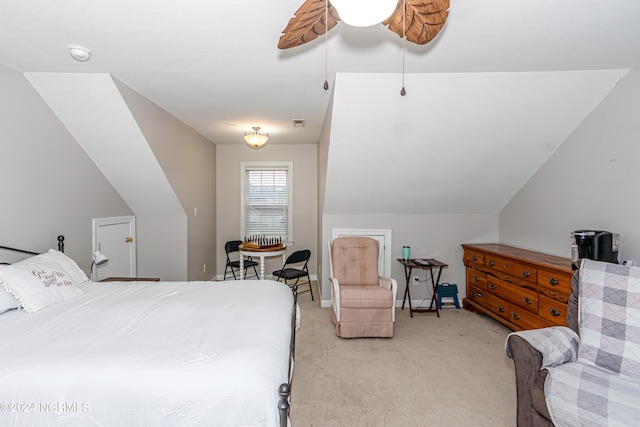 bedroom with light carpet, lofted ceiling, and ceiling fan