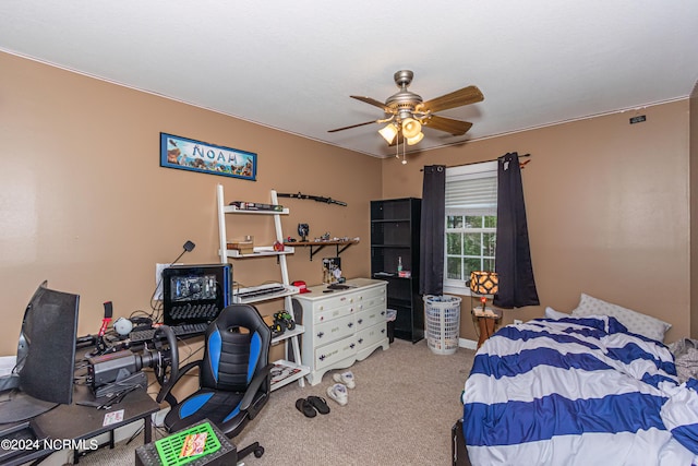 carpeted bedroom with ceiling fan