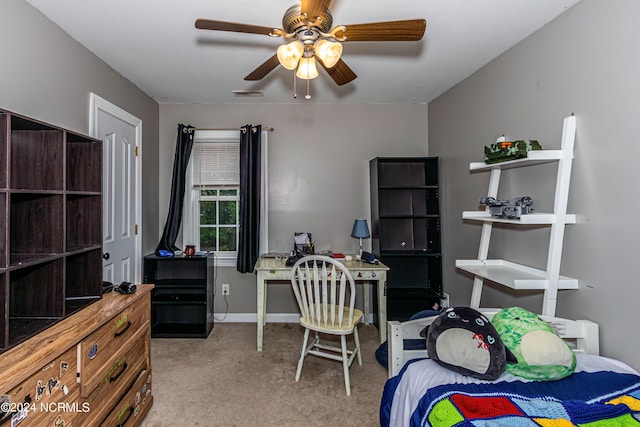 bedroom with ceiling fan and light carpet