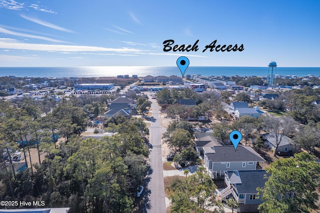 205 NE 59th St, Oak Island, NC 28465 - beach home featuring a carport, concrete driveway, covered porch, and stairway