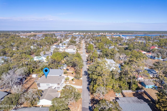 birds eye view of property with a residential view
