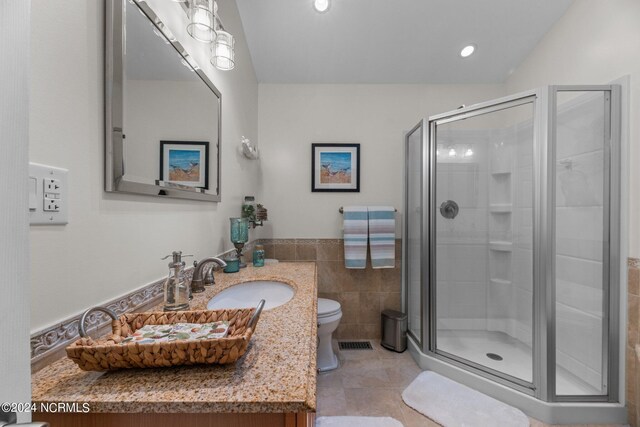 laundry area featuring cabinets, a textured ceiling, and separate washer and dryer