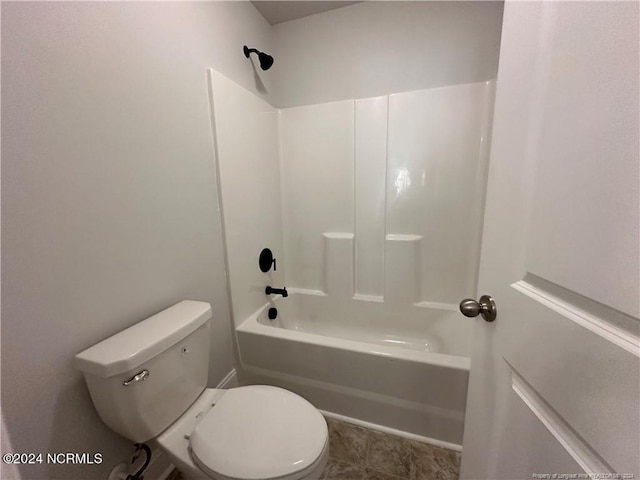 bathroom with shower / bathtub combination and toilet