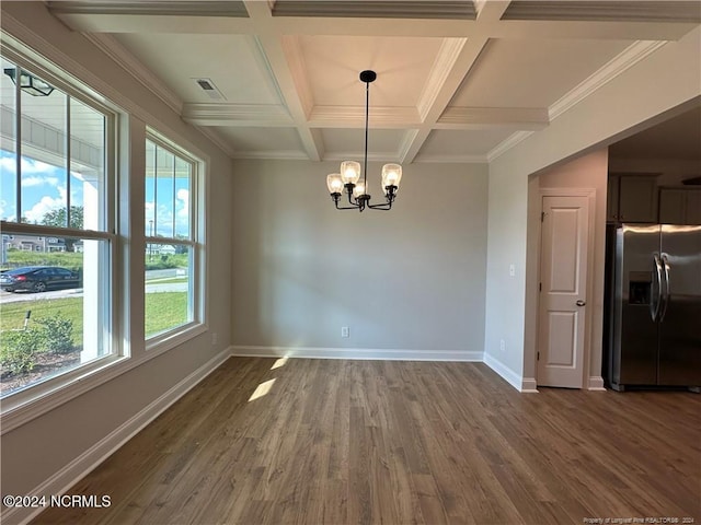 unfurnished dining area featuring coffered ceiling, dark wood-type flooring, crown molding, beam ceiling, and a chandelier