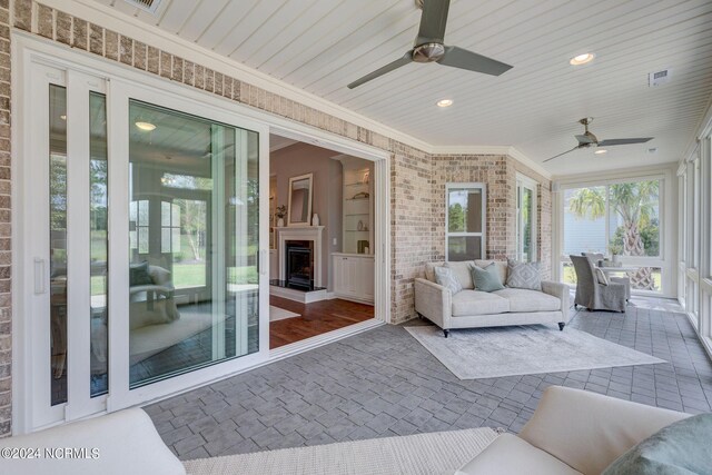 8711 Compass Pointe W Wynd Wynd NE, Leland, NC 28451 - view of patio / terrace with a ceiling fan and visible vents