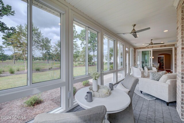8711 Compass Pointe W Wynd Wynd NE, Leland, NC 28451 - sunroom featuring ceiling fan