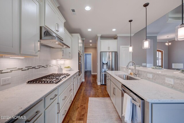 8711 Compass Pointe W Wynd Wynd NE, Leland, NC 28451 - kitchen with visible vents, crown molding, under cabinet range hood, a sink, and stainless steel appliances