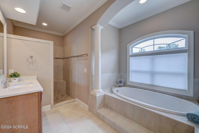 8711 Compass Pointe W Wynd Wynd NE, Leland, NC 28451 - bathroom with tile patterned flooring, a garden tub, visible vents, vanity, and ornate columns