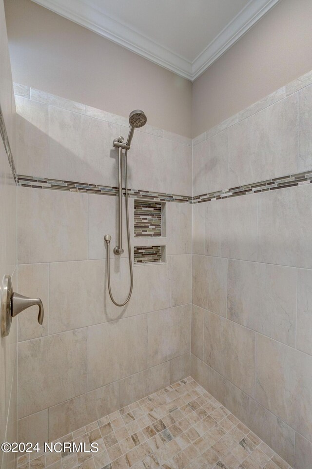 8711 Compass Pointe W Wynd Wynd NE, Leland, NC 28451 - full bathroom with crown molding and tiled shower