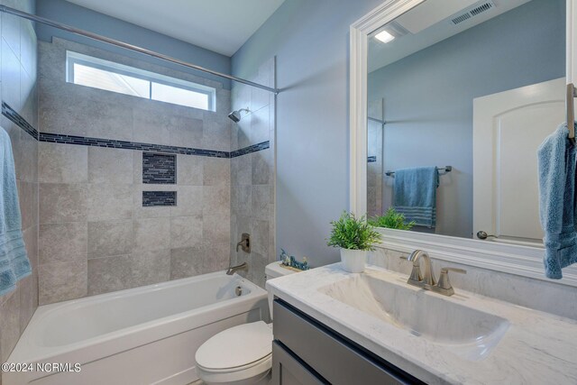 8711 Compass Pointe W Wynd Wynd NE, Leland, NC 28451 - full bath featuring visible vents, shower / tub combination, toilet, and vanity