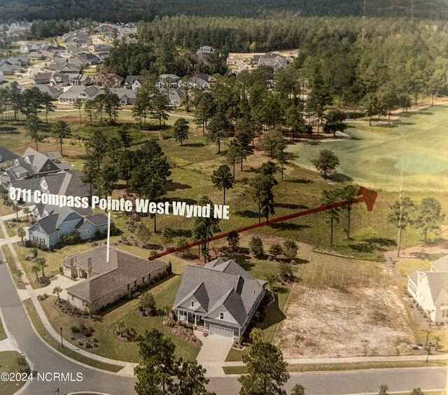 8711 Compass Pointe W Wynd Wynd NE, Leland, NC 28451 - aerial view featuring a residential view