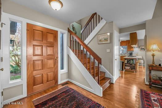 foyer featuring wood-type flooring