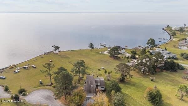 aerial view featuring a rural view and a water view