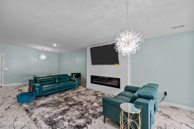 living room with an inviting chandelier