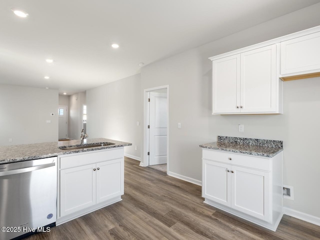 kitchen with dishwasher, stone counters, and white cabinets