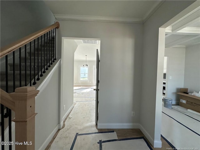 interior space featuring crown molding