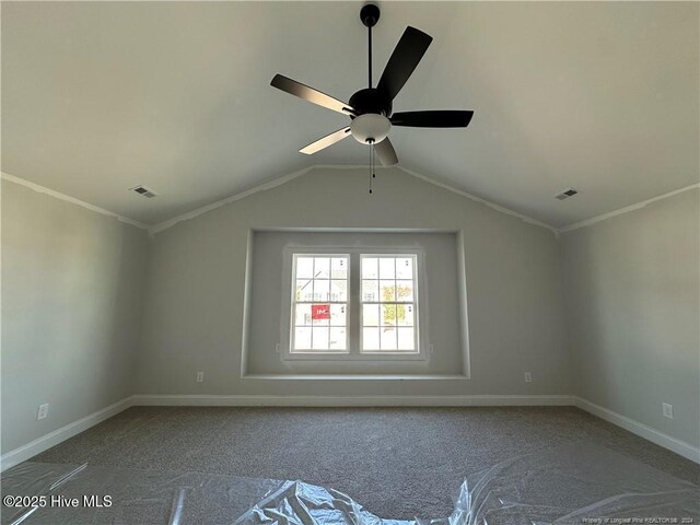 empty room with ceiling fan and lofted ceiling