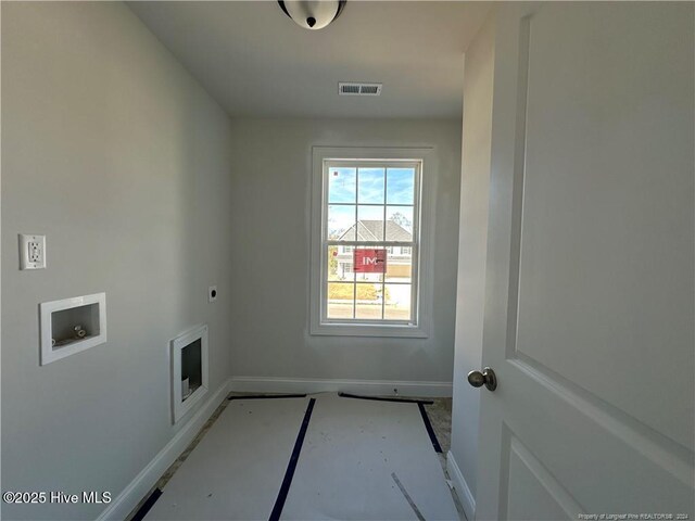 clothes washing area with electric dryer hookup and washer hookup