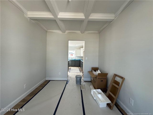 interior space with beamed ceiling and coffered ceiling