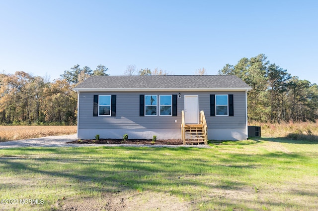 view of front of property with a front lawn