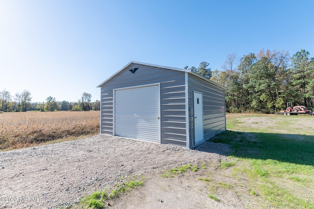 garage with a yard