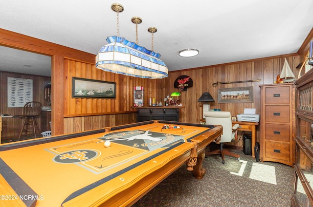 recreation room featuring wooden walls and carpet