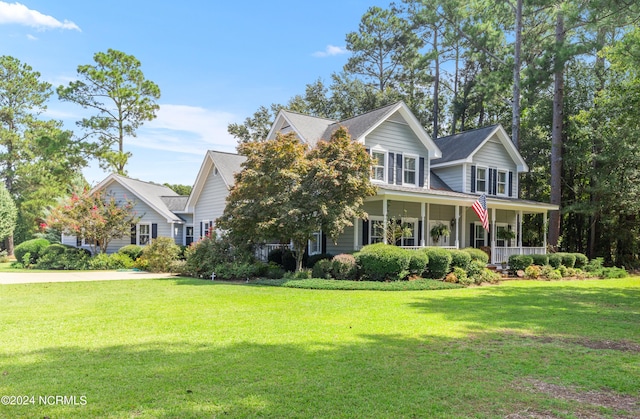 view of front of property with a front lawn and a porch