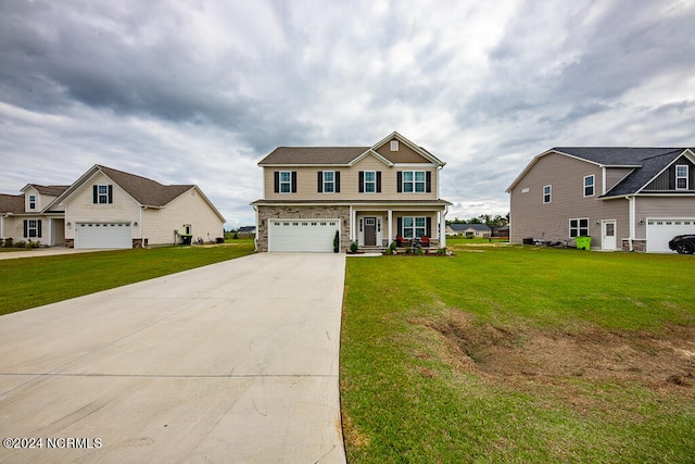 view of front of house with a front yard, a porch, and a garage